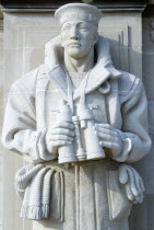 ENGLAND, Hampshire, Portsmouth, World War Two Naval memorial on Southsea seafront designed by Sir Edmund Maufe with sculpture by Sir Charles Wheeler of a sailor holding a pair of binoculars.