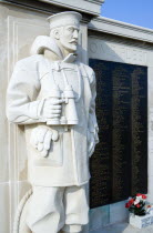 ENGLAND, Hampshire, Portsmouth, World War Two Naval memorial on Southsea seafront designed by Sir Edmund Maufe with sculpture by Sir Charles Wheeler of a sailor holding a pair of binoculars.