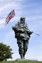 England, Hampshire, Portsmouth, Royal Marines Museum on Southsea Seafront with bronze sculpture titled Yomper by Philip Jackson modelled on a photograph of Corporal Peter Robinson yomping to Sapper Hi...