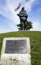 England, Hampshire, Portsmouth, Royal Marines Museum on Southsea Seafront with bronze sculpture titled Yomper by Philip Jackson modelled on a photograph of Corporal Peter Robinson yomping to Sapper Hi...