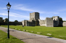 England, Hampshire, Portsmouth, Portchester Castle showing the Norman 12th Century Tower and 14th Century Keep within the Roman 3rd Century Saxon Shore Fort.