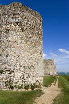 England, Hampshire, Portsmouth, Portchester Castle Norman 12th Century flint walls rebuilt on the site of the Roman 3rd Century Saxon Shore Fort.