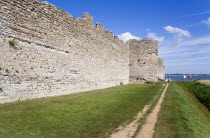 England, Hampshire, Portsmouth, Portchester Castle Norman 12th Century flint walls rebuilt on the site of the Roman 3rd Century Saxon Shore Fort.
