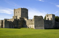 England, Hampshire, Portsmouth, Portchester Castle showing the Norman 12th Century Tower and 14th Century Keep within the Roman 3rd Century Saxon Shore Fort.