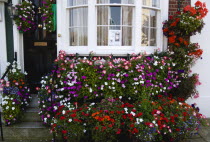 ENGLAND, Hampshire, Portsmouth, House in Old Portsmouth with a flower display of window boxes and hanging baskets celebrating the City's win in the Britain In Bloom competition.