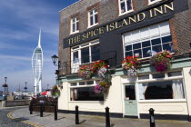 ENGLAND, Hampshire, Portsmouth, Harbour wth the 170 metre tall Spinnaker Tower seen from the Spice Island Inn public house.