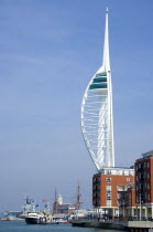 ENGLAND, Hampshire, Portsmouth, Harbour with the 170 metre Spinnaker Tower and Historic Naval Dockyard seen from Spice Island in Old Portsmouth.