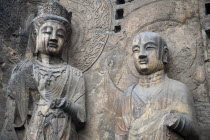 China, Henan Province, Luoyang, Carved Buddhist statues, Fengxian Temple, Tang Dynasty Longmen Grottoes and Caves.