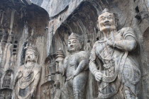 China, Henan Province, Luoyang, Carved statues, Fengxian Temple, Tang Dynasty Longmen Grottoes and Caves.
