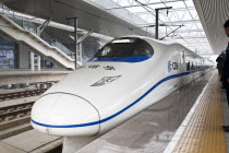 China, Henan Province, Luoyang, Bullet train in a railway station.