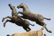 China, Shaanxi Province, Xian, Statue of two galloping horses.