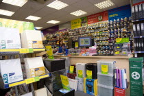 England, West Sussex, Chichester, Ryman's office staionery store with two female shop assistants behind counter.