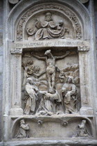 Austria, Vienna, Stone carving of the crucifixion on the outside of the Stephansdom Cathedral.