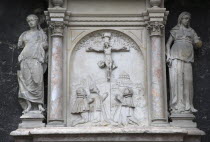 Austria,  Vienna, Carving of the crucifixion on the outside of the Stephansdom Cathedral.
