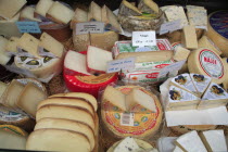 Austria, Vienna, Dispaly of cheeses in the Naschmarkt.