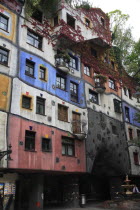 Austria, Vienna, Hundertwasser-Krawinahaus colourful exterior.