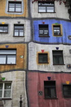 Austria, Vienna, Hundertwasser-Krawinahaus colourful exterior.