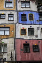 Austria, Vienna, Hundertwasser-Krawinahaus colourful exterior.