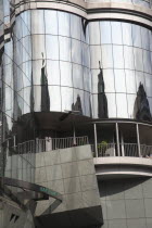 Austria, Vienna, Haas Haus modern glass fronted building.