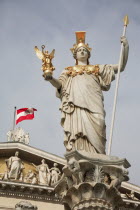 Austria, Vienna, Statue of Athena in front of Parliament.