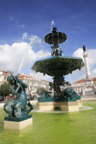 Portugal, Lisbon, Fountain and monument to Dom Pedro IV in Rossio Square.