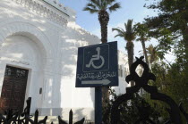 Tunisia, El Jem, Arabic disabled access sign.