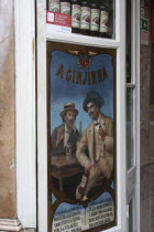 Portugal, Lisbon, A Ginjinha cherry liqueur bar sign.