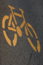Australia, Queensland, Gold Coast, Coolangatta, Cycle lane symbol painted on tarmac.