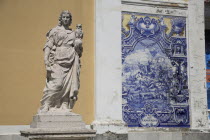 Portugal, Lisbon, Statue & azulejo depicting battle scene in Eduardo VII Park.
