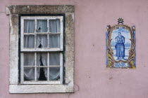 Portugal, Lisbon, Window and azulejo in the Bairro Alto district.