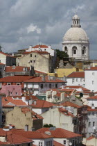 Portugal, Lisbon, View across the old town of Alfama to the dome of the Church of Santa Engracia.  