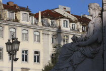 Portugal, Lisbon, Carving at the base of the statue of Dom Pedro IV in Praca Rossio Square.