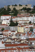 Portugal, Lisbon, Sao Jorge Castle with the Baixa district in the foreground.