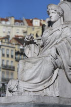 Portugal, Lisbon, Carving at the base of the statue of Dom Pedro IV in Praca Rossio Square.