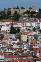 Portugal, Lisbon, Sao Jorge Castle with the Baixa district in the foreground.