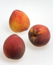 Food, Fruit, Peach, Three ripe red peaches Prunus persica.