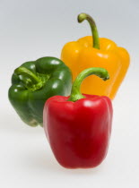 Food, Vegetables, Peppers, Red green and yellow sweet capsicum bell peppers.
