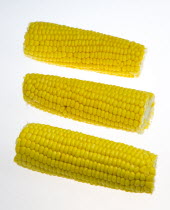 Food, Vegetables, Sweet Corn, Three ripe harvested yellow sweetcorn cobs.