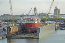 USA, Florida, Tampa, Deep sea geotechnical drilling vessel Furgo Explorer in floating dry dock for repairs.