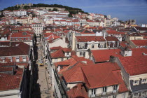 Portugal, Estremadura, Lisbon, View across Baixa with Sao Jorge Castle & Se Cathedral in the background.