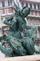 Portugal, Estremadura, Lisbon, Figure on the fountain in Rossio Square.