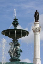Portugal, Estremadura, Lisbon, Fountain and statue of Dom Pedro IV in Rossio Square.