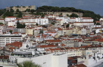 Portugal, Estremadura, Lisbon, View across the Baixa district with Sao Jorge Castle in the background.