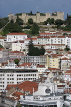 Portugal, Estremadura, Lisbon, View across the Baixa district to Sao Jorge Castle.