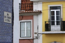 Portugal, Estremadura, Lisbon, Details of town houses and street sign in Bairro Alto district.