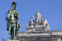 Portugal, Estremadura, Lisbon, Statue of King Jose 1 & the Triumph Arch in Praca do Comercio.