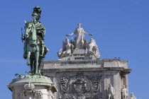 Portugal, Estremadura, Lisbon, Statue of King Jose 1 & the Triumph Arch in Praca do Comercio.