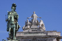 Portugal, Estremadura, Lisbon, Statue of King Jose 1 & the Triumph Arch in Praca do Comercio.