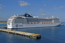 Mexico, Quintana Roo, Costa Maya, Italian MSC cruise ship Poesia alongside the pier.