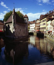 France, Rhone-Alpes, Haute-Savoie, Annecy. The twelth century Palais de l Isle  originally the town prison  now a museum situated in the Thiou Canal.